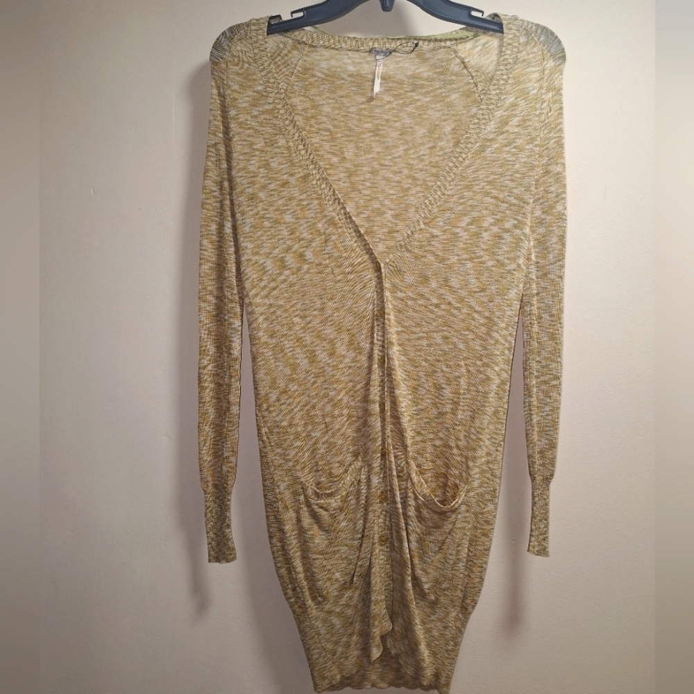 A Free People long length semi-sheer cardigan in a ladies' size XS. EUC.